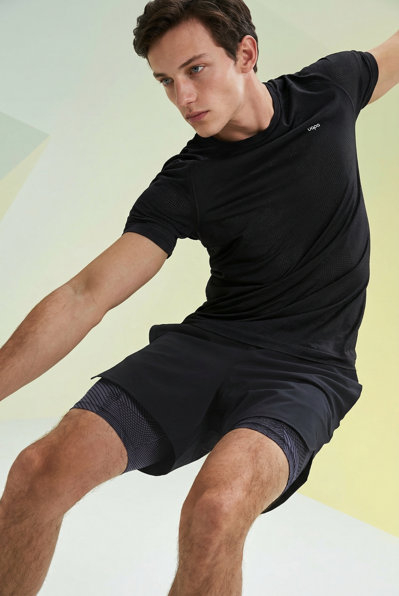 UAPA Motion Shirt in black — men's activewear shirt with UAPA logo