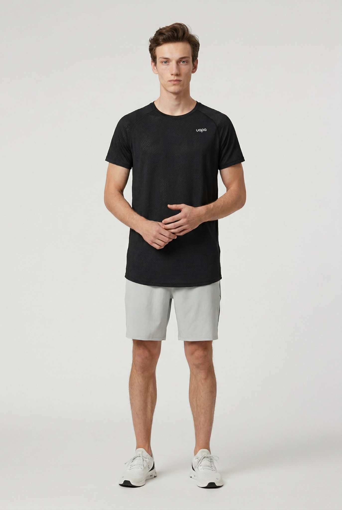 UAPA Motion Shirt in black — men's activewear shirt with UAPA logo