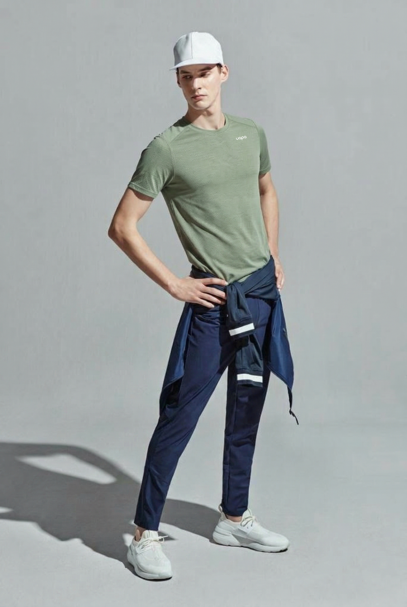 UAPA Motion Shirt in green — men's activewear shirt with UAPA logo