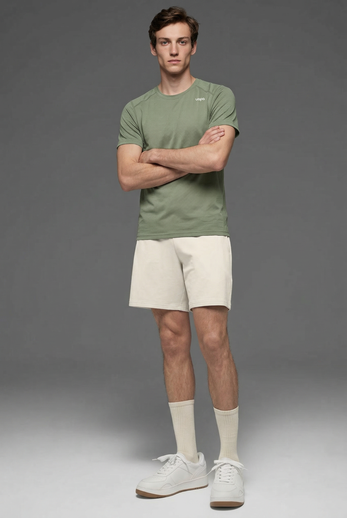UAPA Motion Shirt in green — men's activewear shirt with UAPA logo