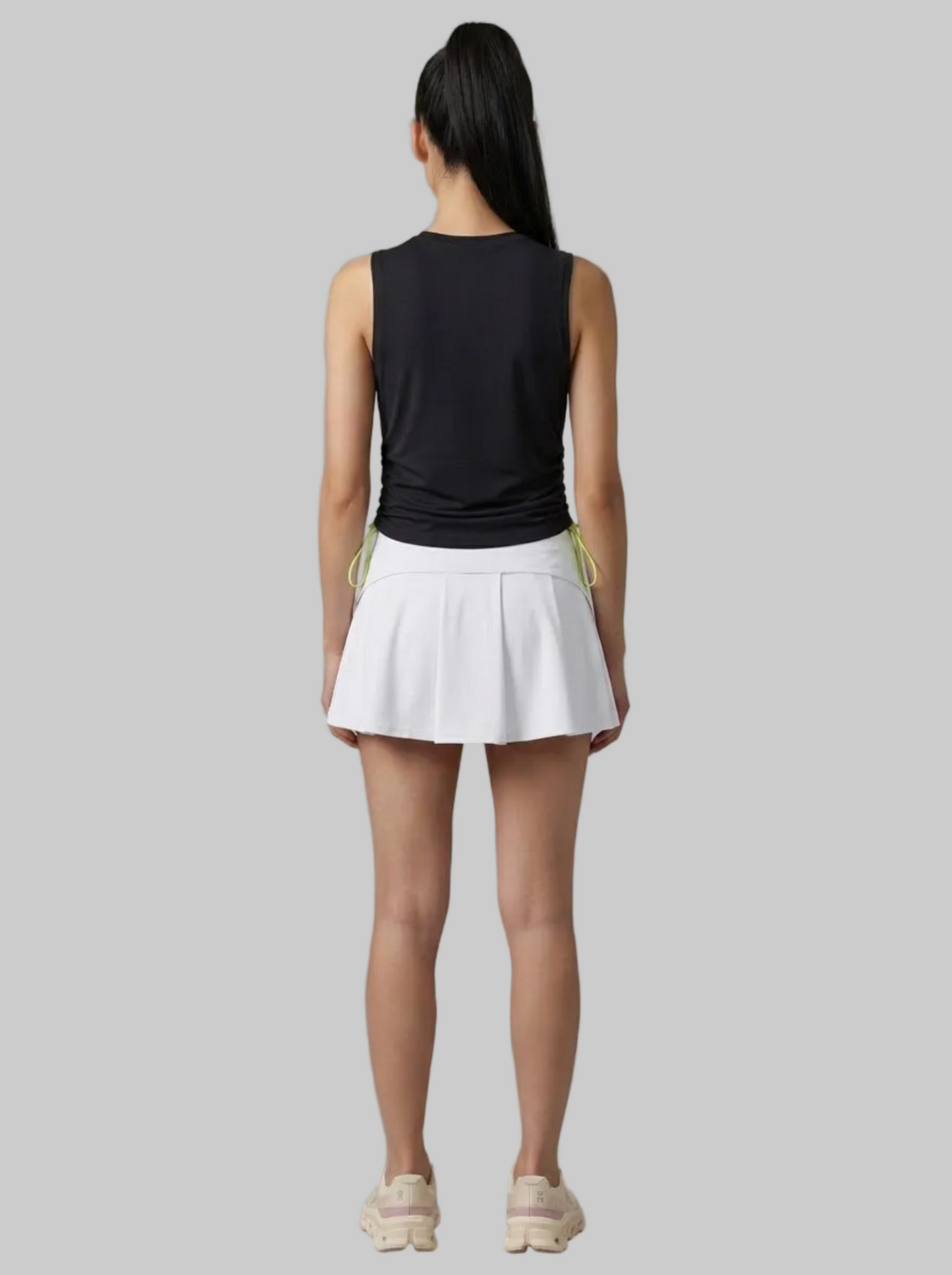 UAPA Flow Top in black — women's activewear top
