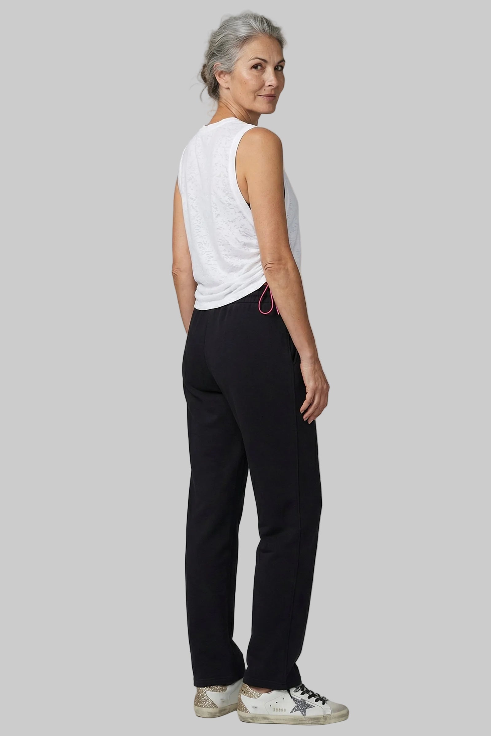 UAPA Flow Top in white — women's activewear top