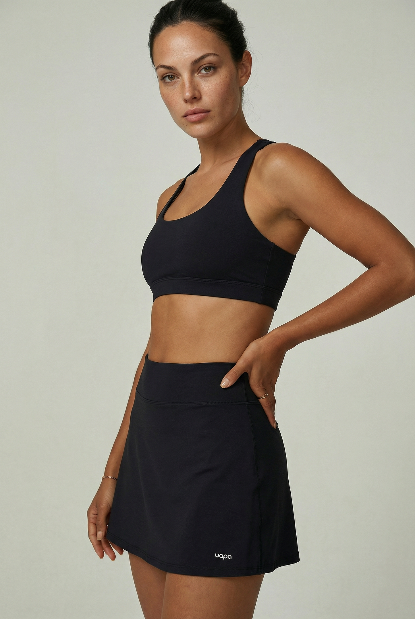 UAPA Core Skirt in black — women's activewear skirt