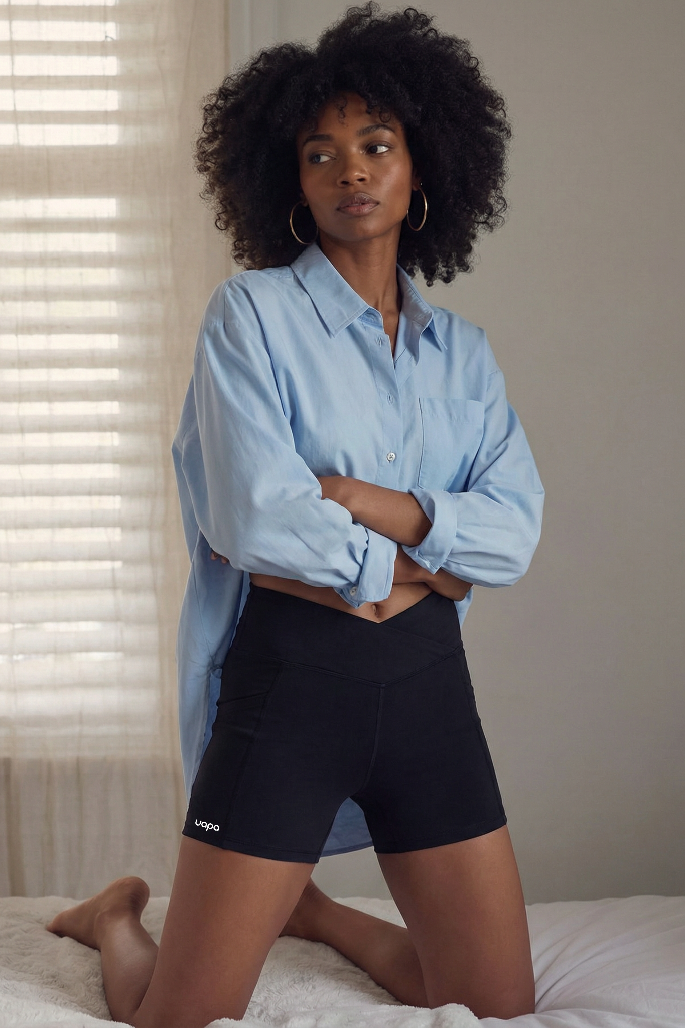 UAPA Everyday Biker in black — women's activewear biker shorts with UAPA logo