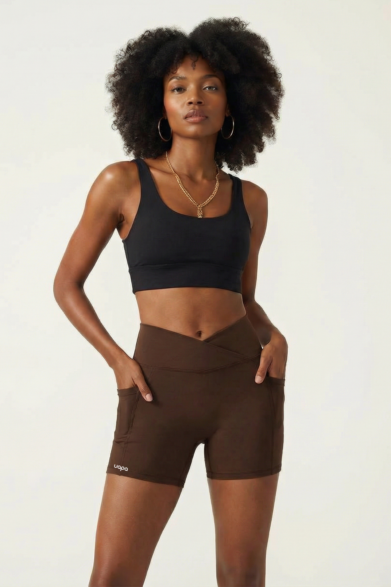 UAPA Everyday Biker in brown — women's activewear biker shorts with UAPA logo
