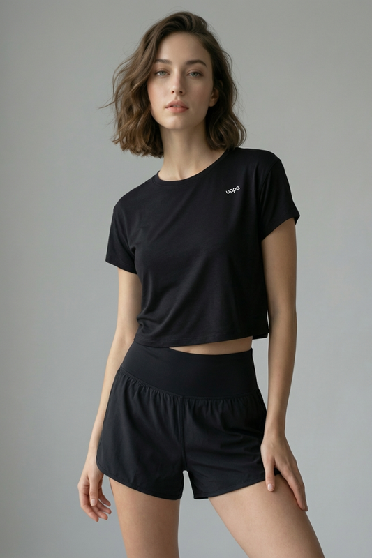 UAPA Relaxed Crop in black — women's activewear crop top with UAPA logo
