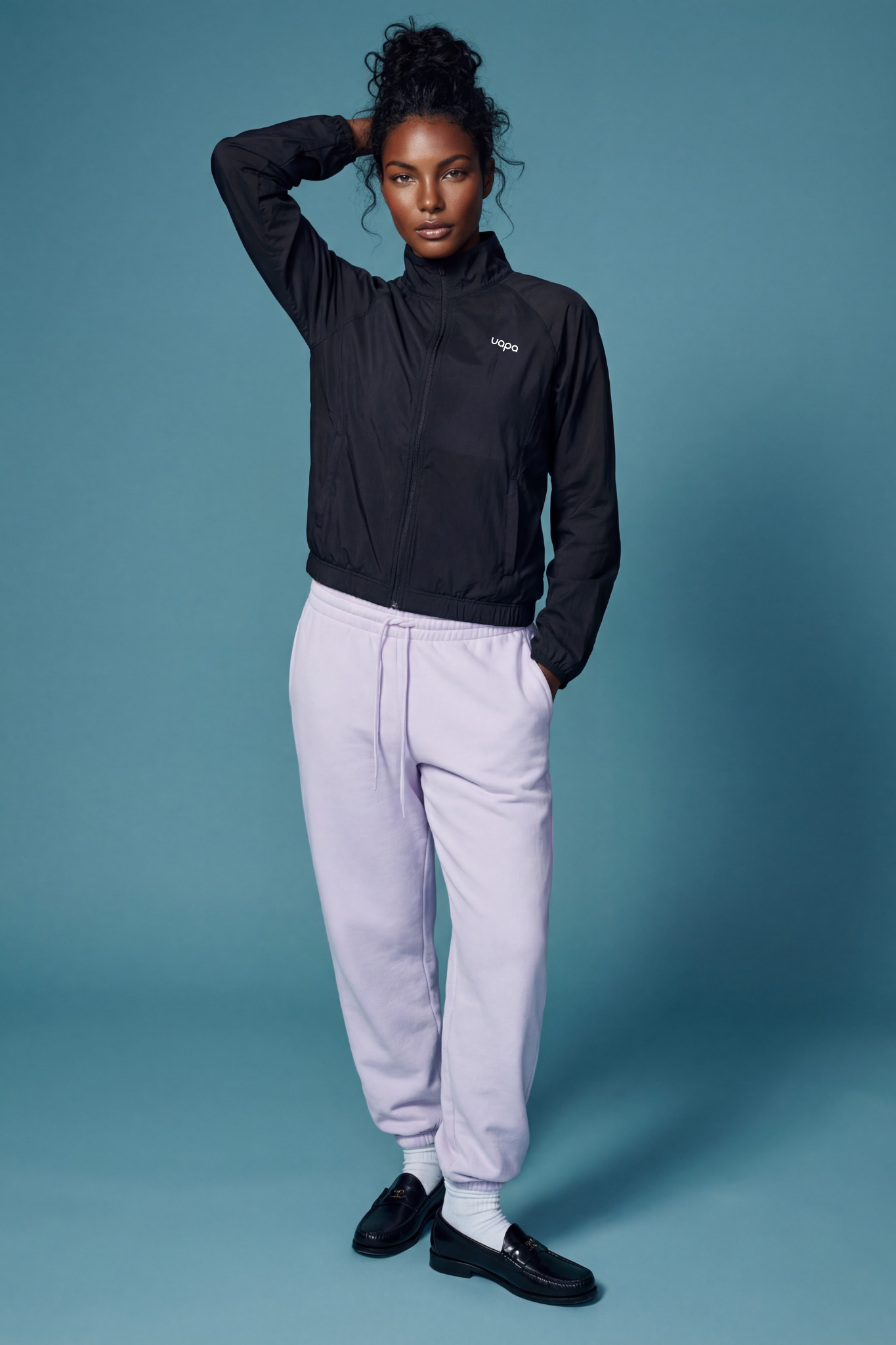 UAPA Studio Jacket in black — women's activewear jacket with UAPA logo