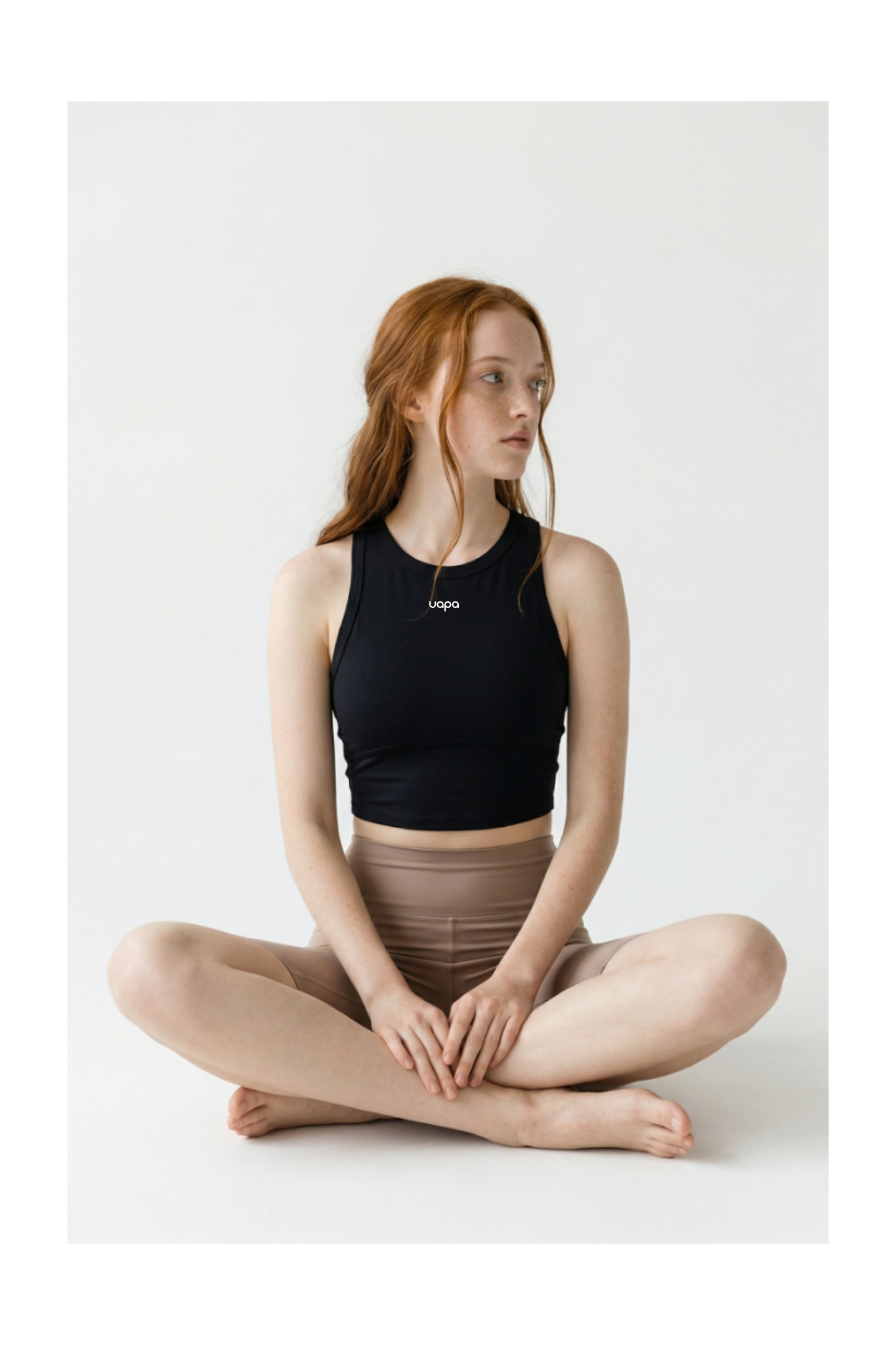 UAPA Crop Tank in black — women's activewear tank top with UAPA logo