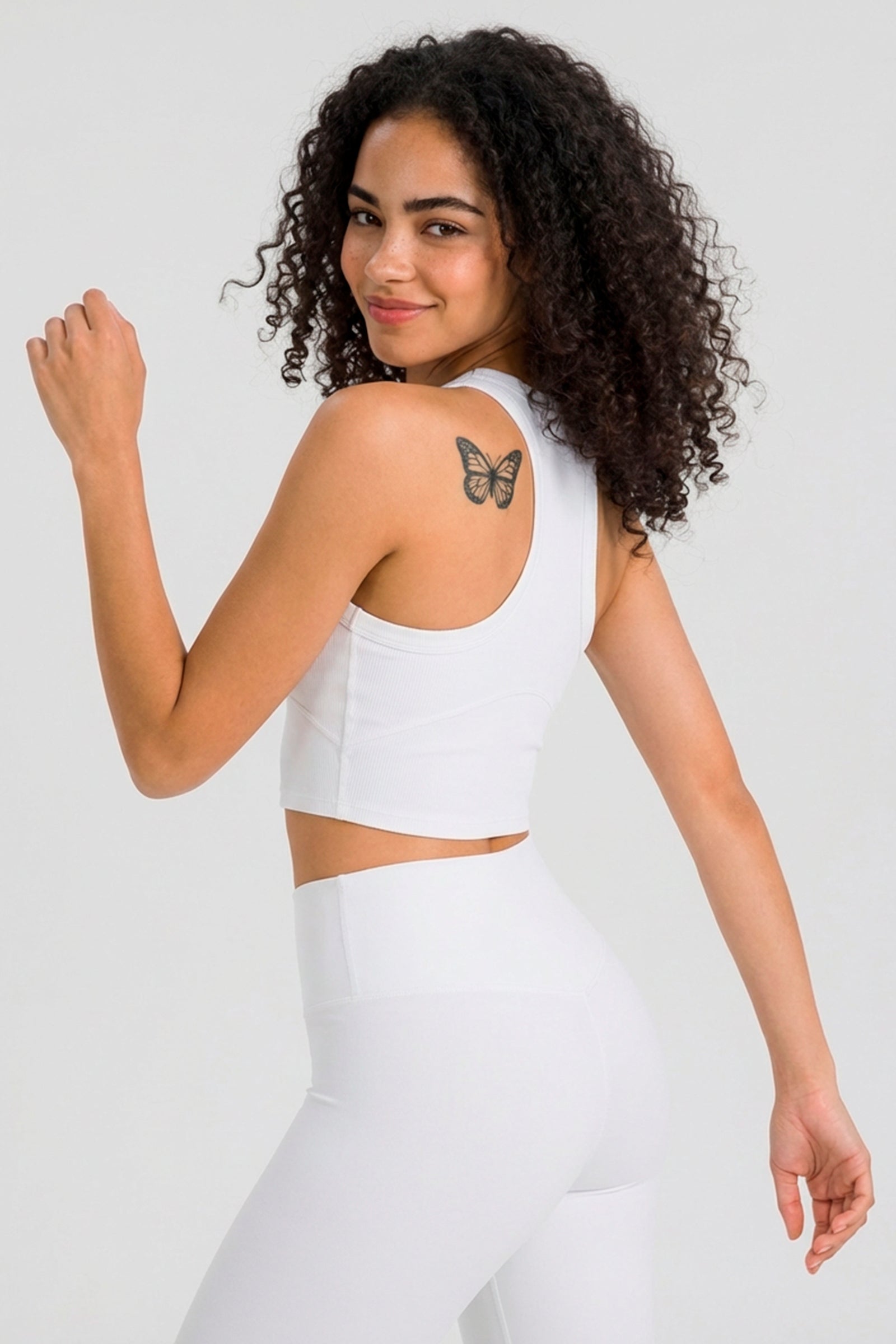 UAPA Crop Tank in white — women's activewear tank top