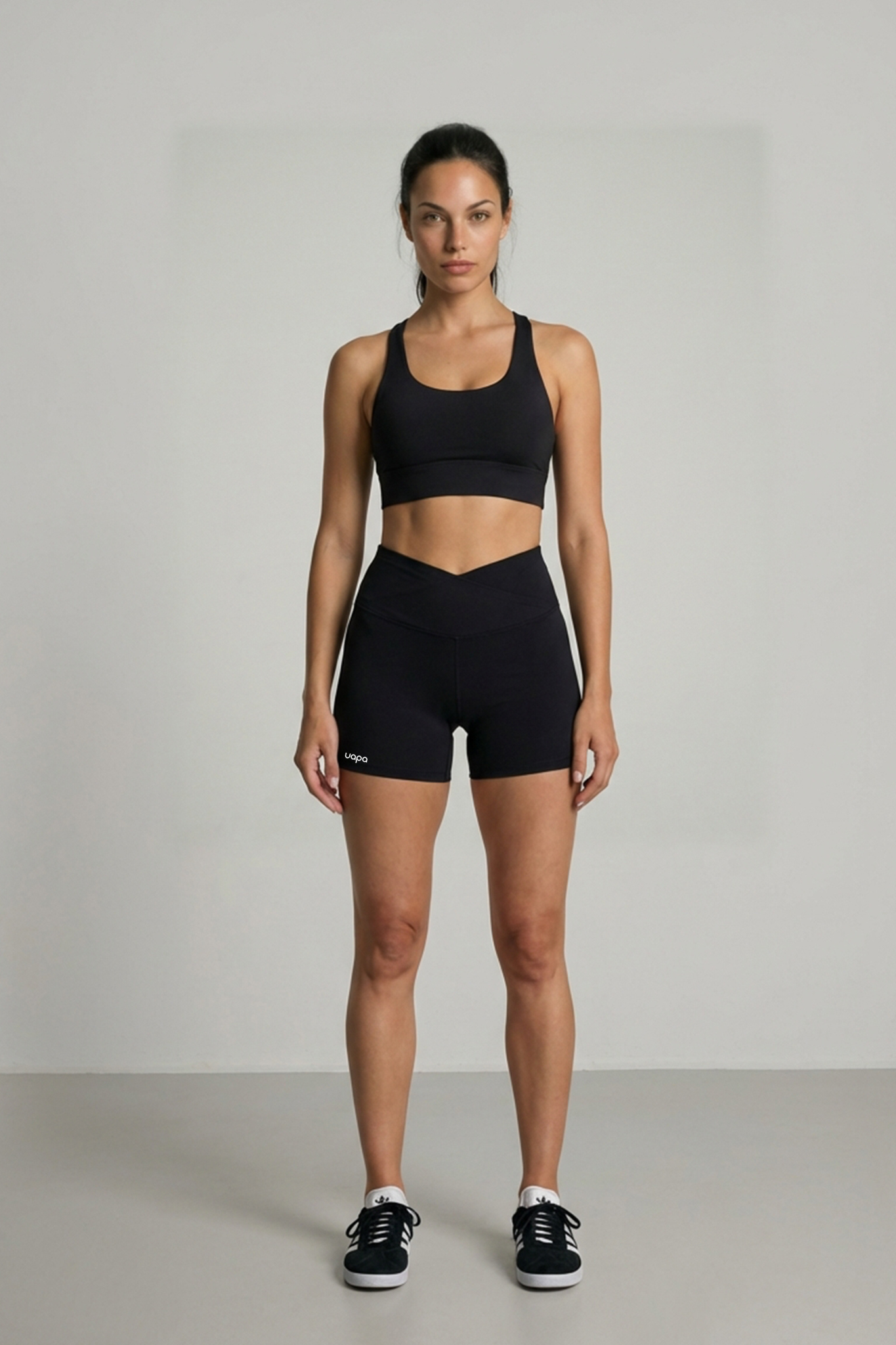 UAPA Core Biker in black — women's activewear biker shorts with UAPA logo