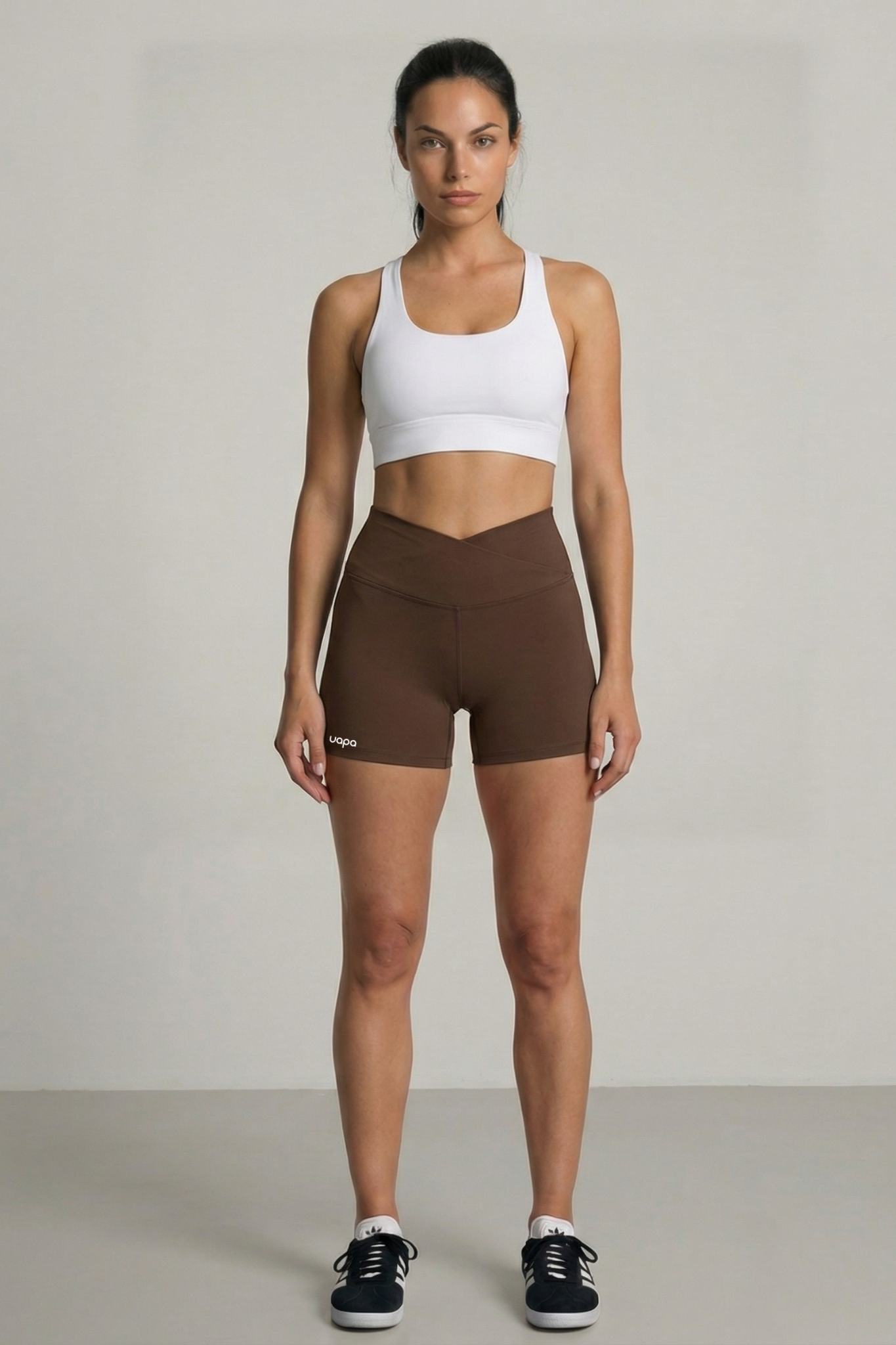 UAPA Core Biker in brown — women's activewear biker shorts with UAPA logo