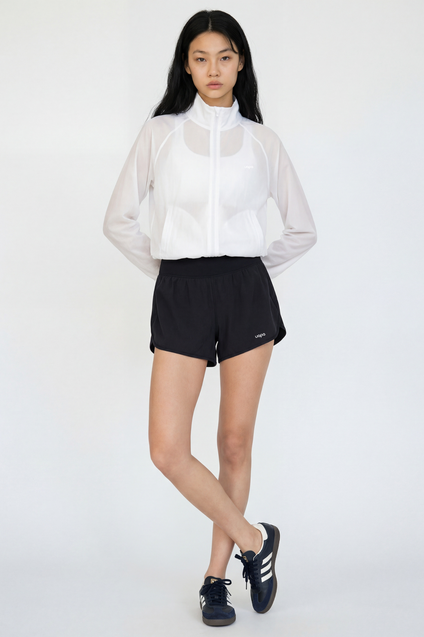 UAPA Core Shorts in black — women's activewear shorts with UAPA logo