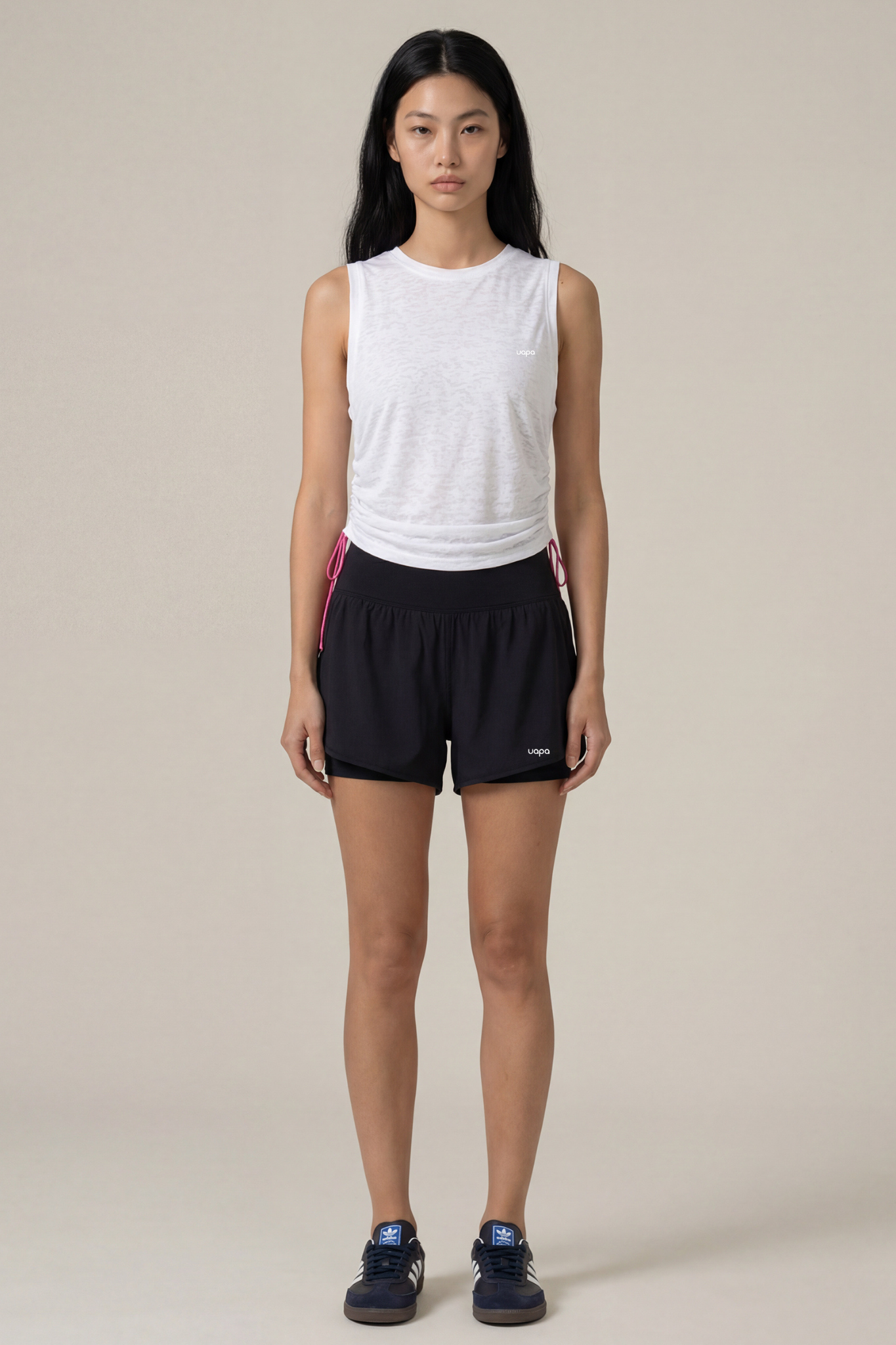 UAPA Core Shorts in black — women's activewear shorts with UAPA logo