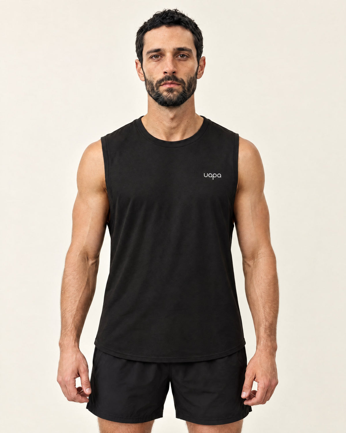 UAPA Motion Tank in Black — men's activewear tank top, front view