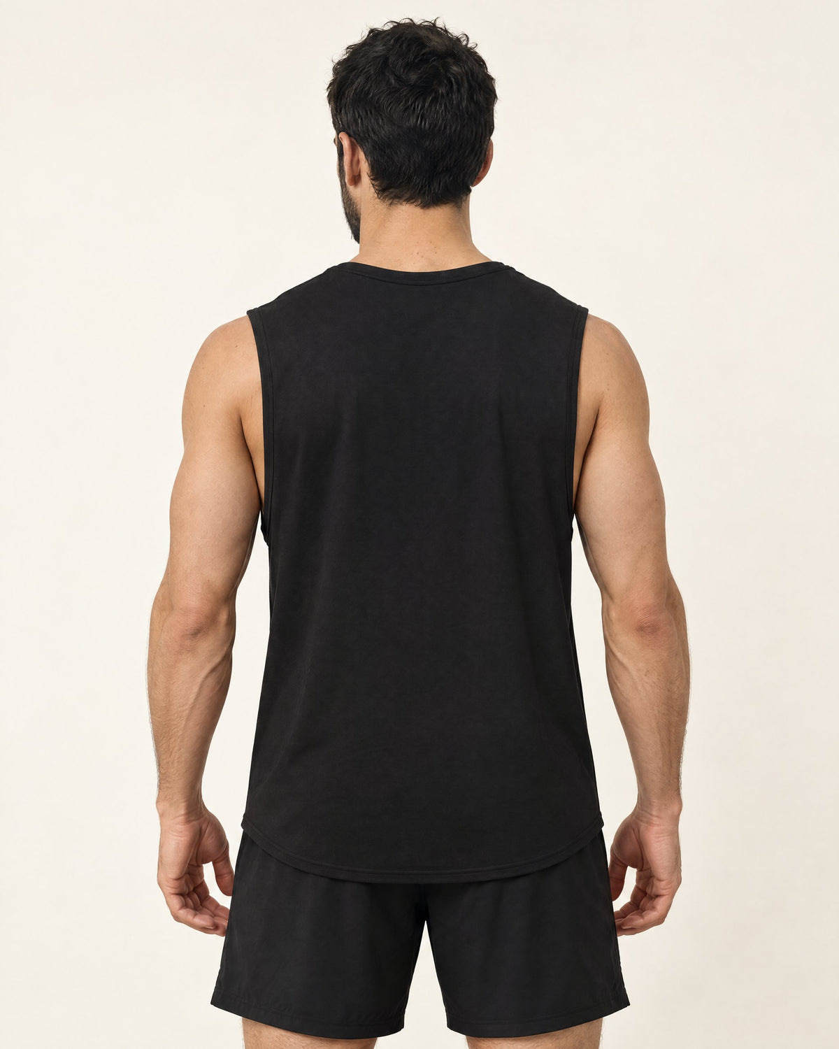 UAPA Motion Tank in Black — men's activewear tank top, back view