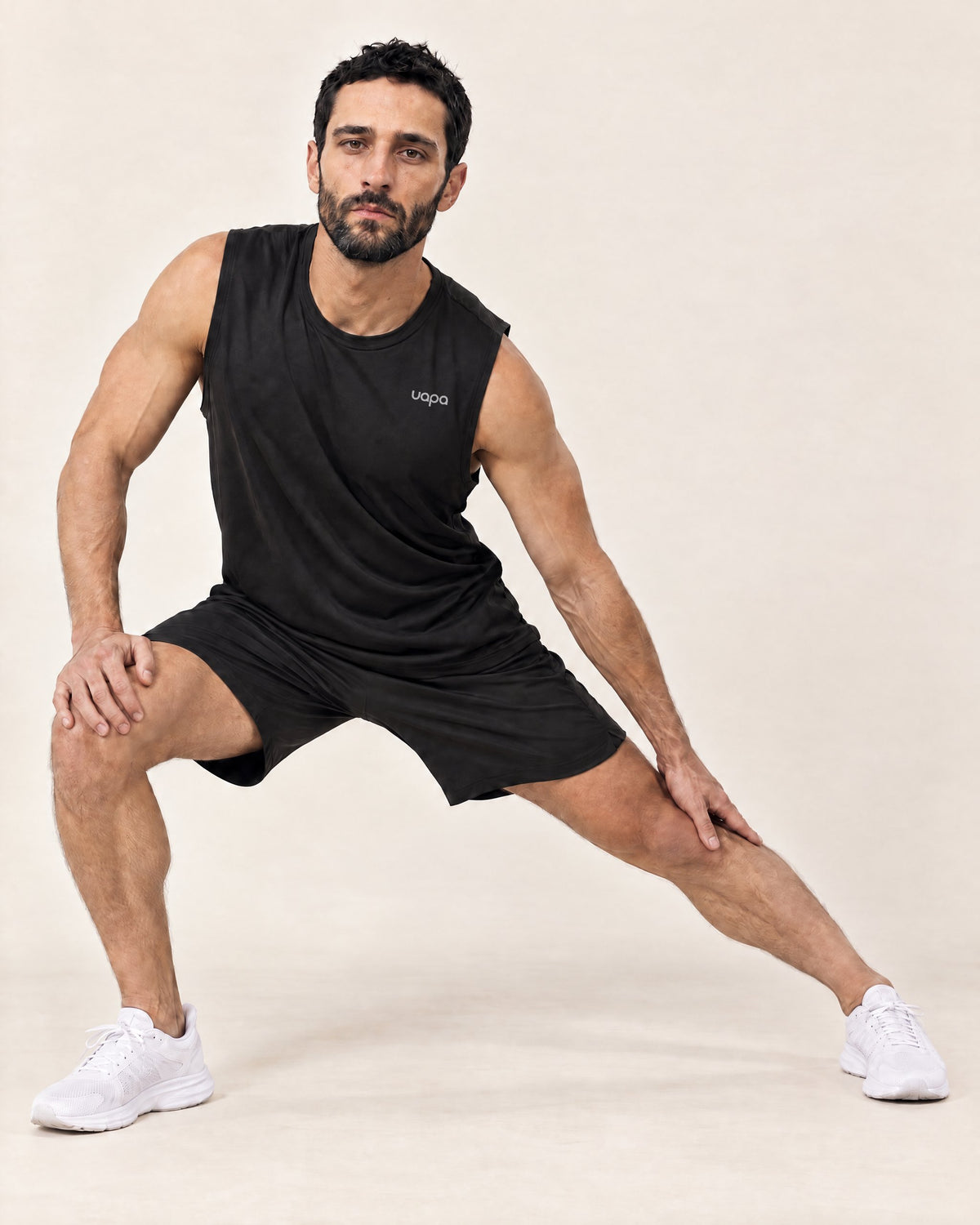UAPA Motion Tank in Black — men's activewear tank top, in movement