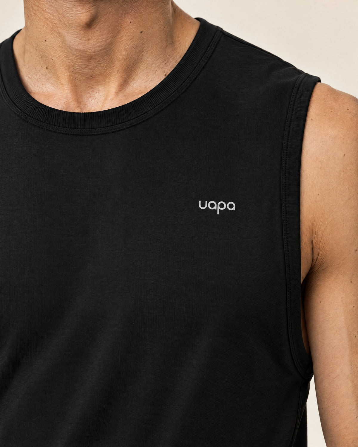UAPA Motion Tank in Black — men's activewear tank top, fabric detail
