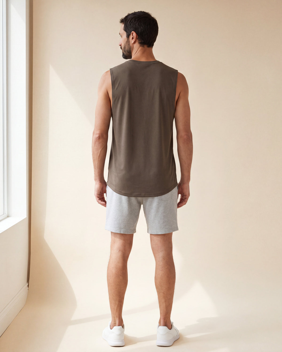 UAPA Motion Tank in Brown — men's activewear tank top, back view