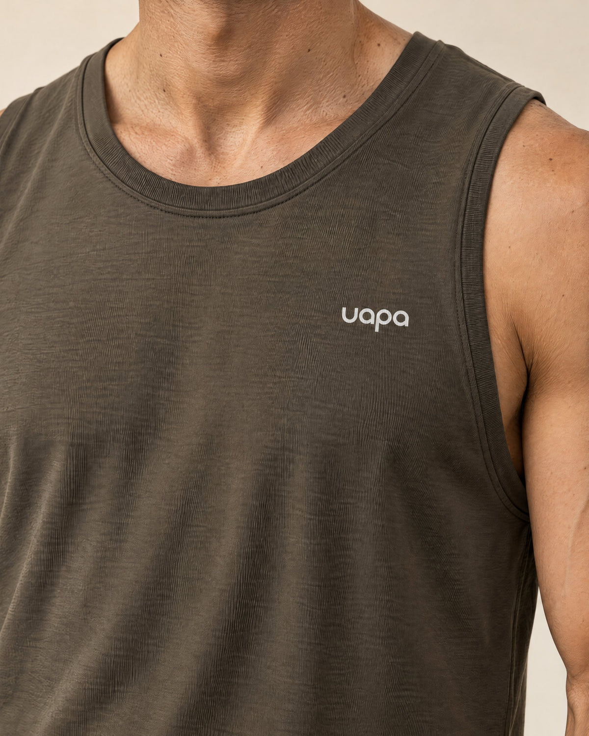UAPA Motion Tank in Brown — men's activewear tank top, fabric detail