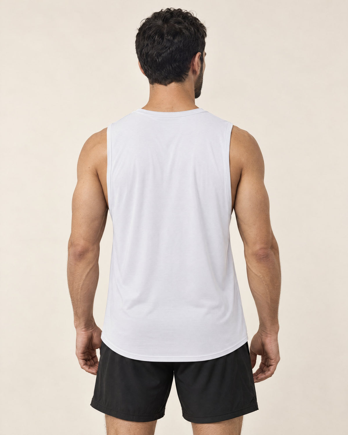 UAPA Motion Tank in White — men's activewear tank top, back view