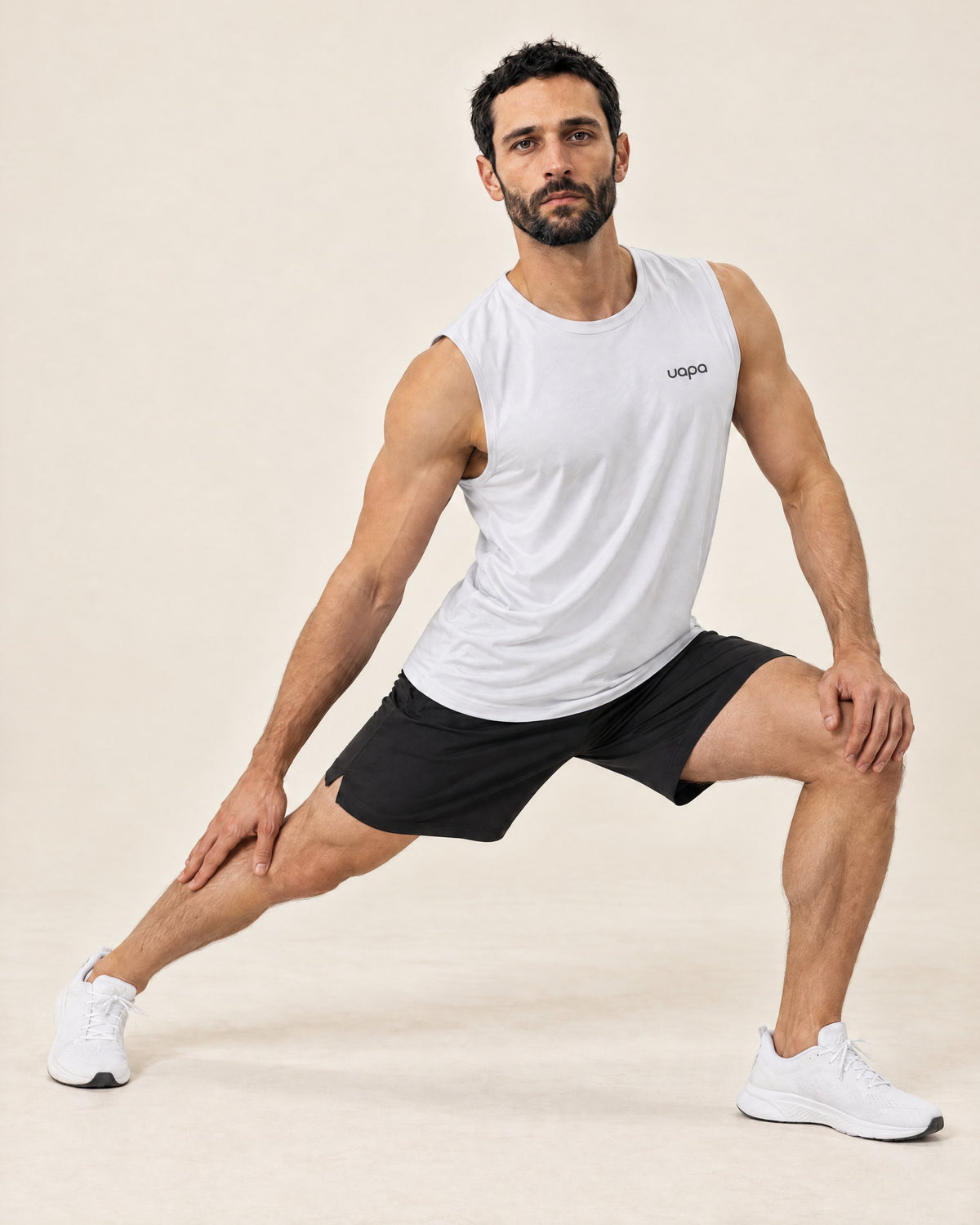 UAPA Motion Tank in White — men's activewear tank top, in movement