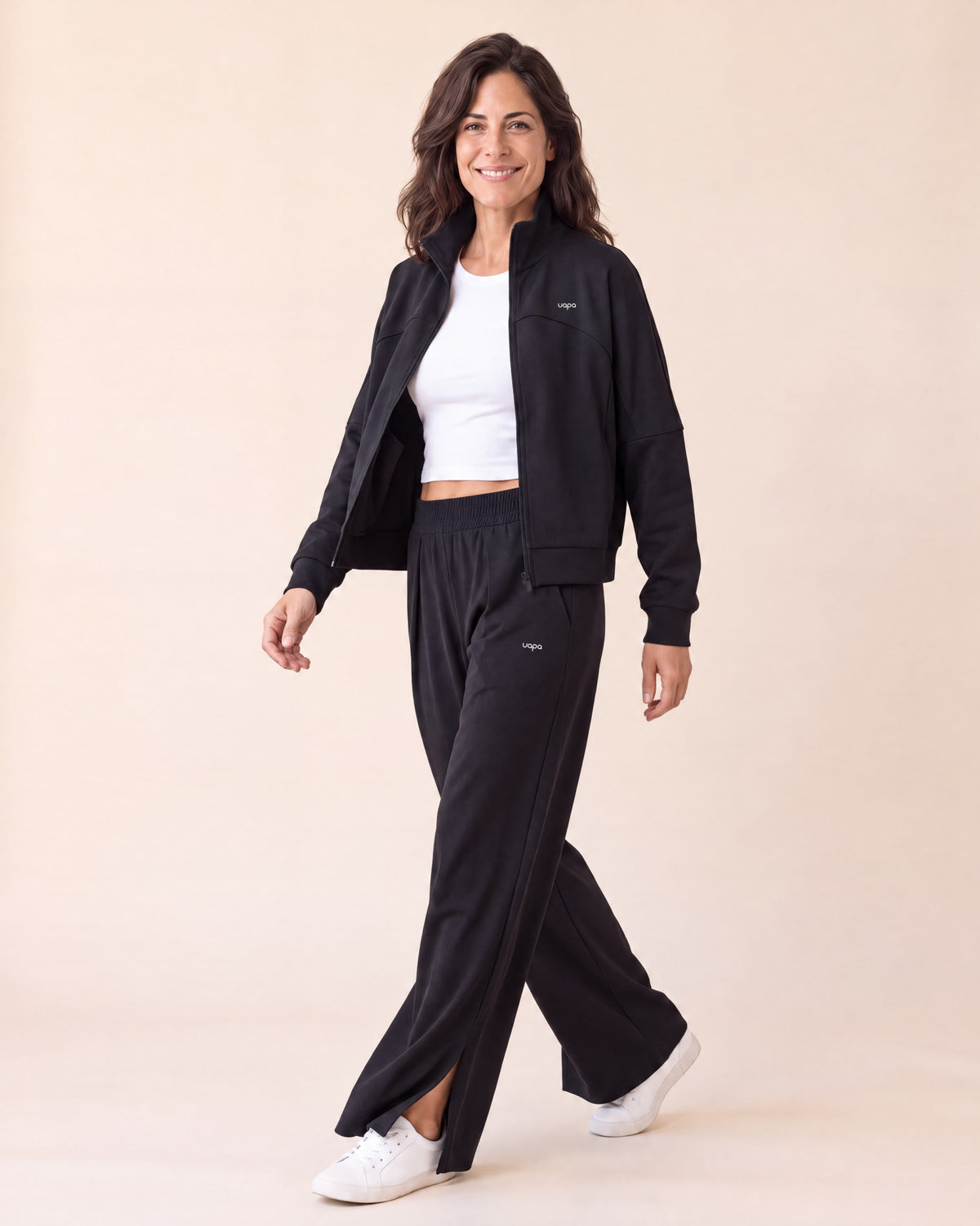 UAPA Tempo Jacket in Black — women's activewear jacket, in movement