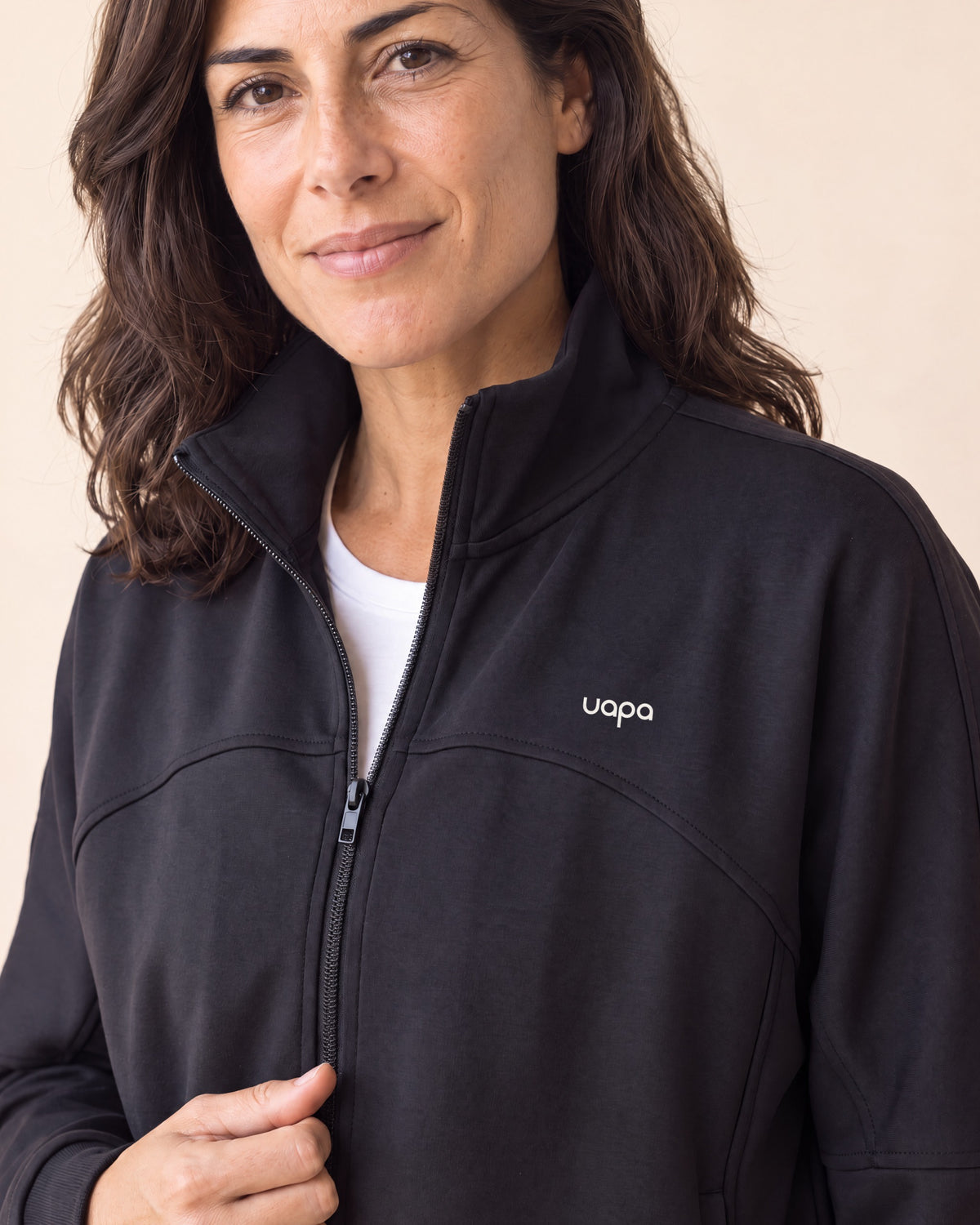 UAPA Tempo Jacket in Black — women's activewear jacket, detail
