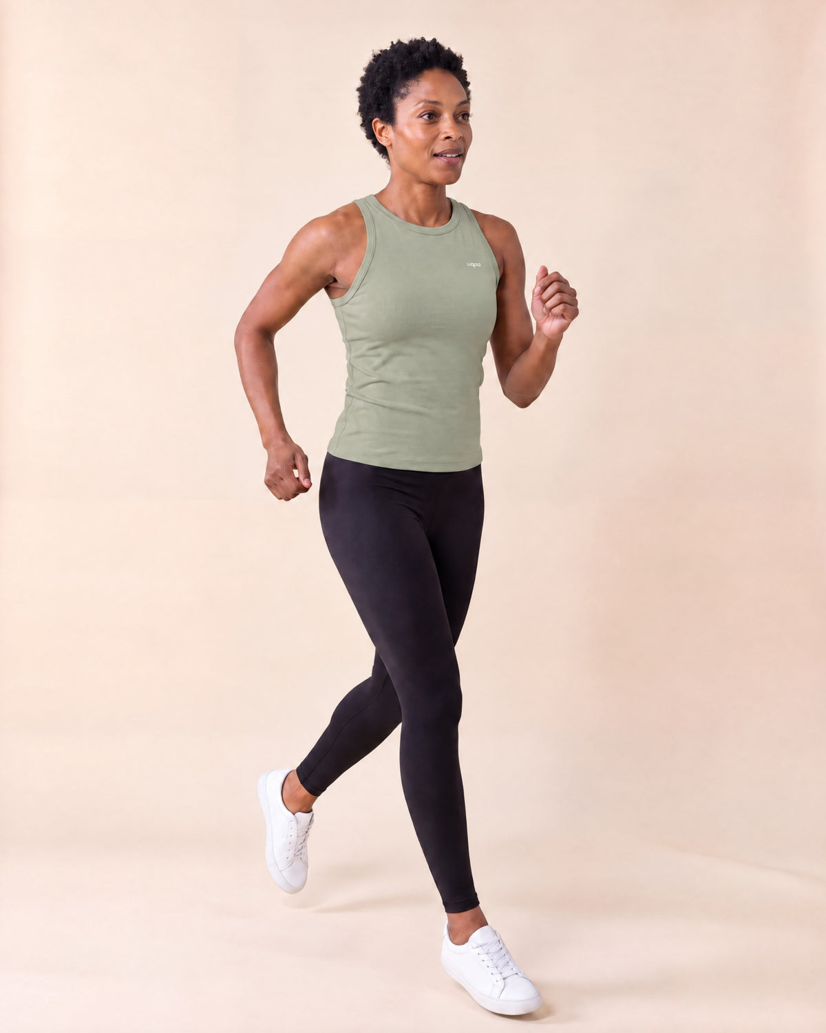 UAPA Vital Tank in Green — women's activewear tank, in movement